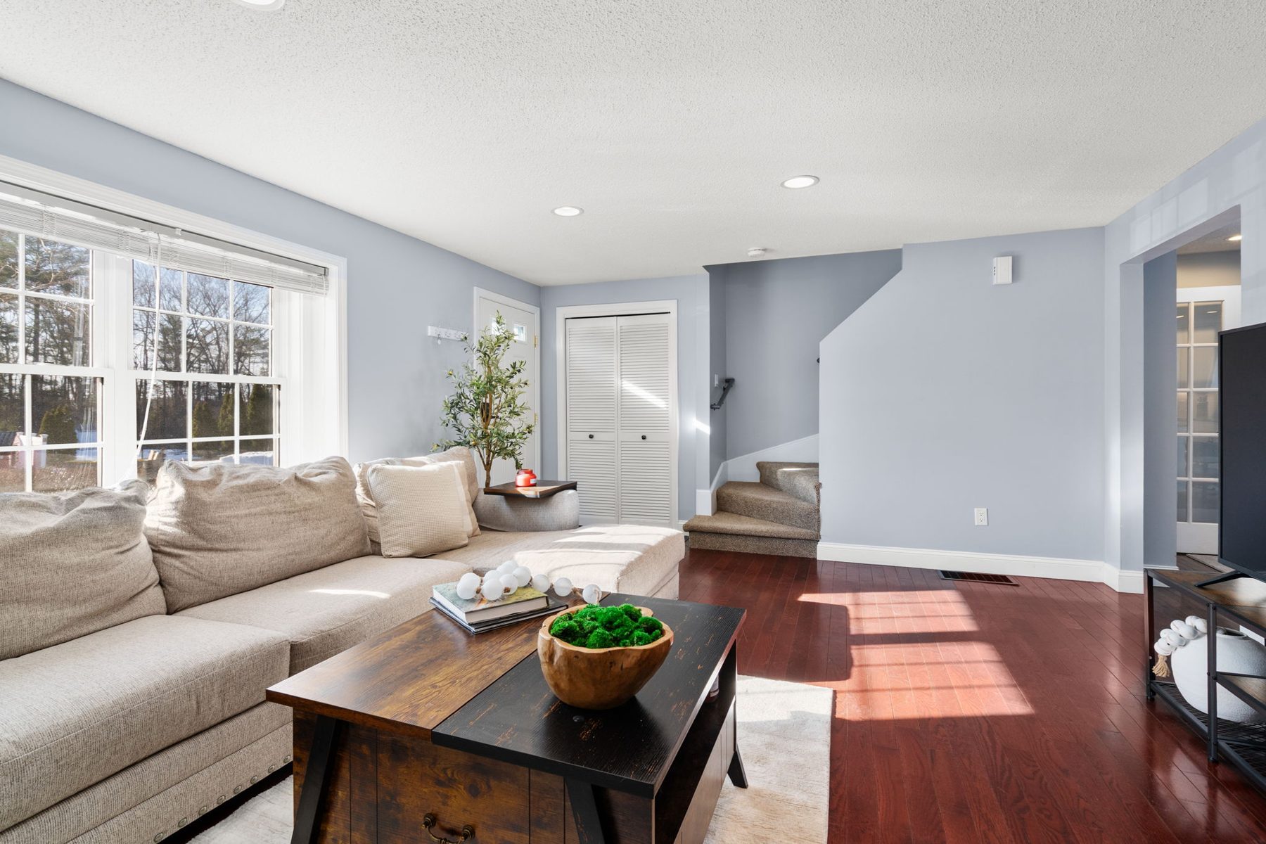 Staged living room at 5 Meadowhill Ct, South Easton, MA