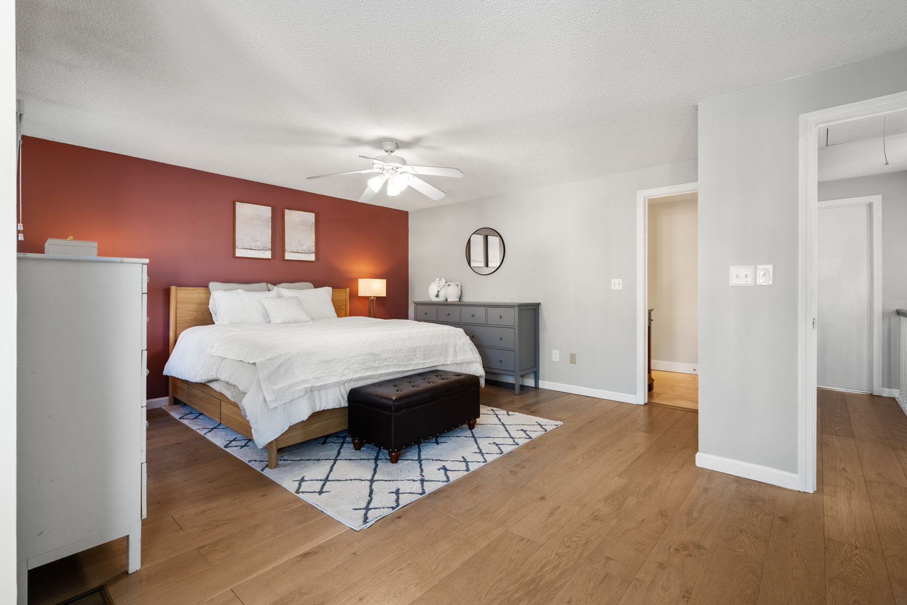 Staged primary bedroom at 5 Meadowhill Ct, South Easton, MA