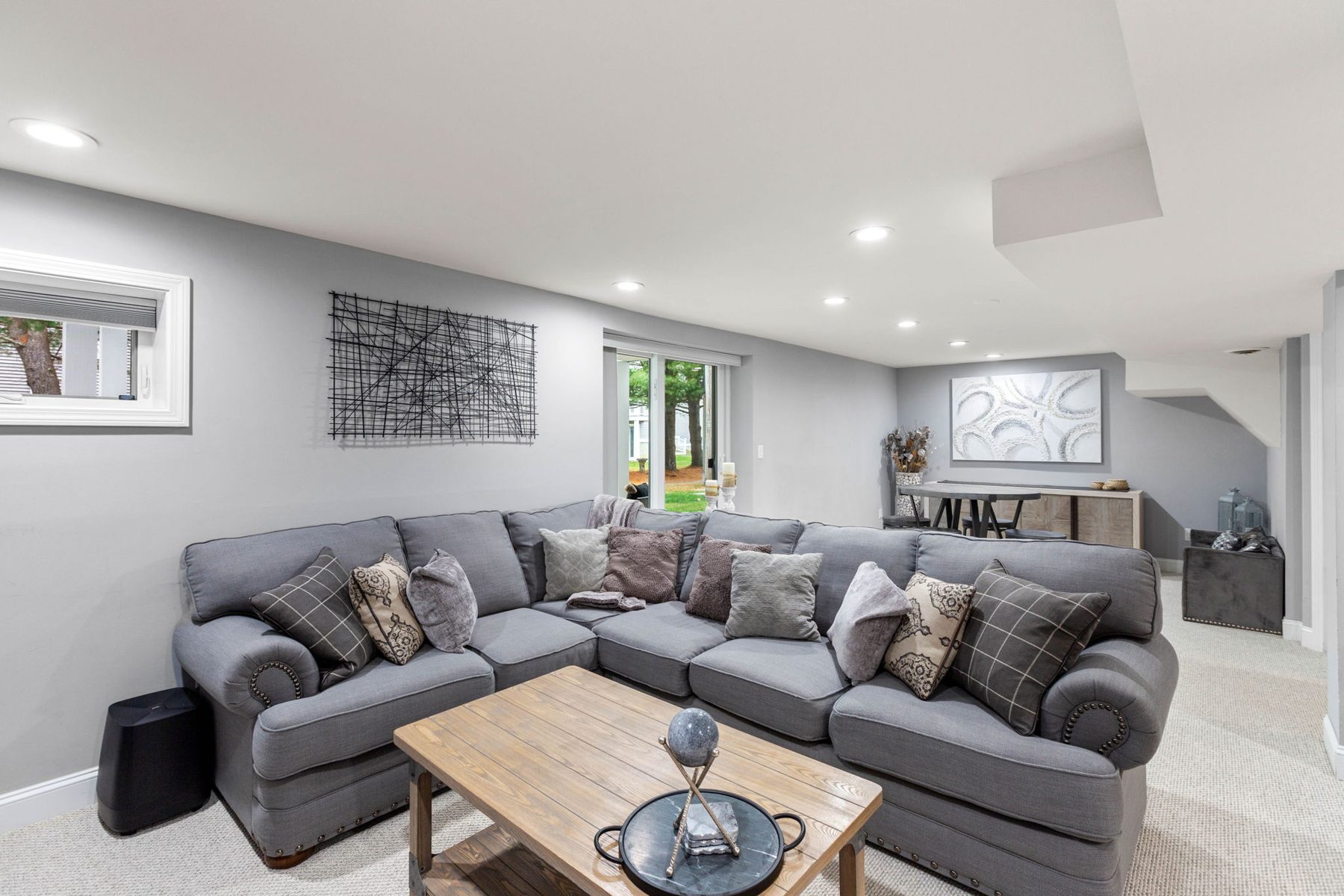 Staged lower-level family room at 75 Foundry St, South Easton, MA