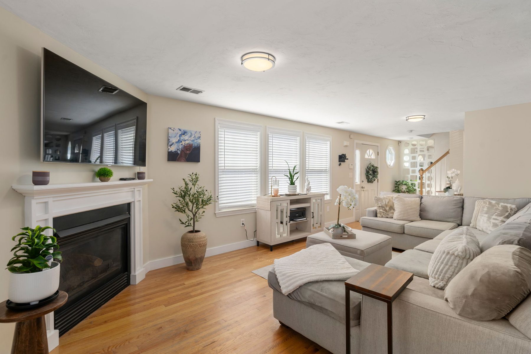 Staged living room at 142 Norwell St, Dorchester, MA