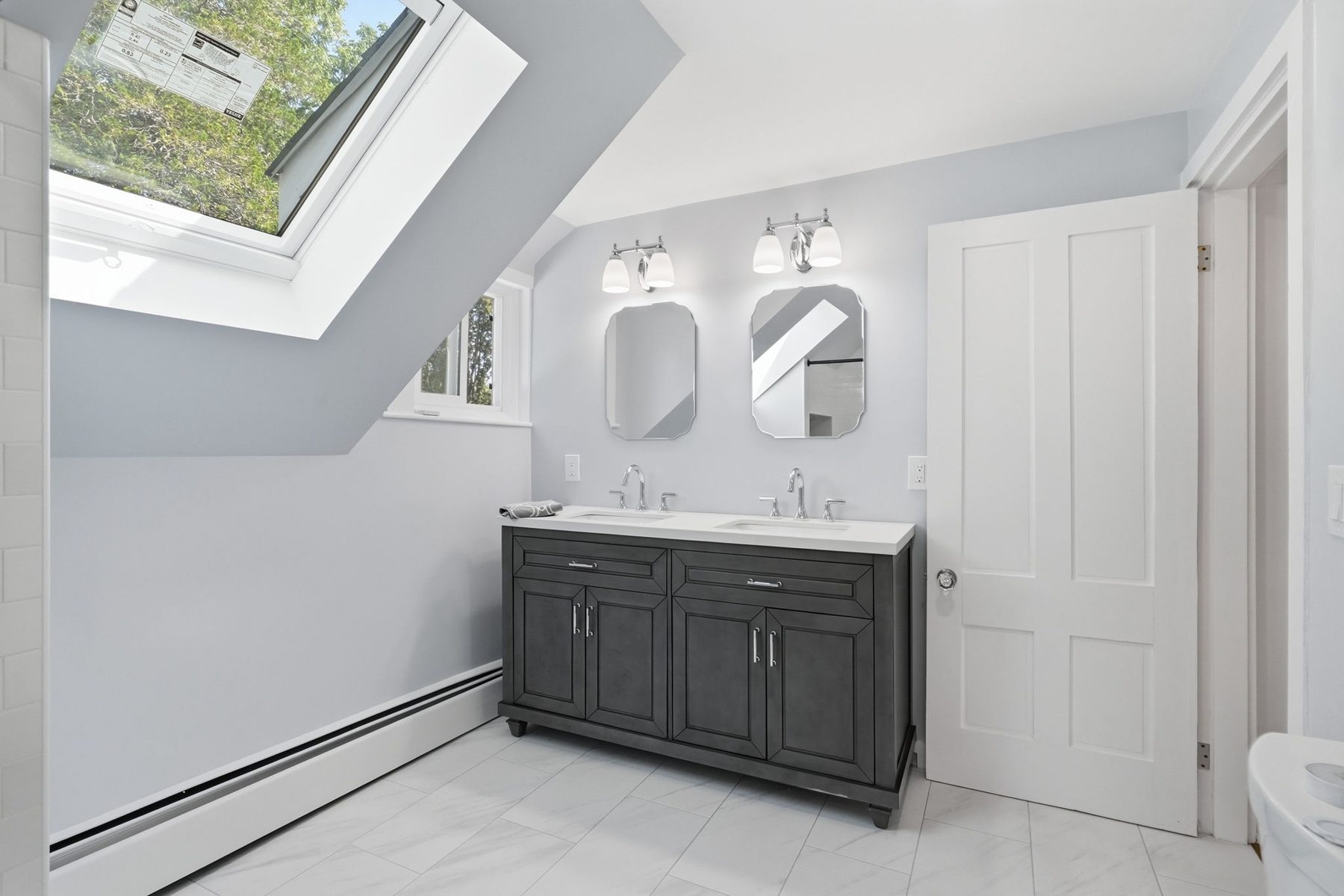 8 Pemberton Road, Wayland — Full bath under a skylight