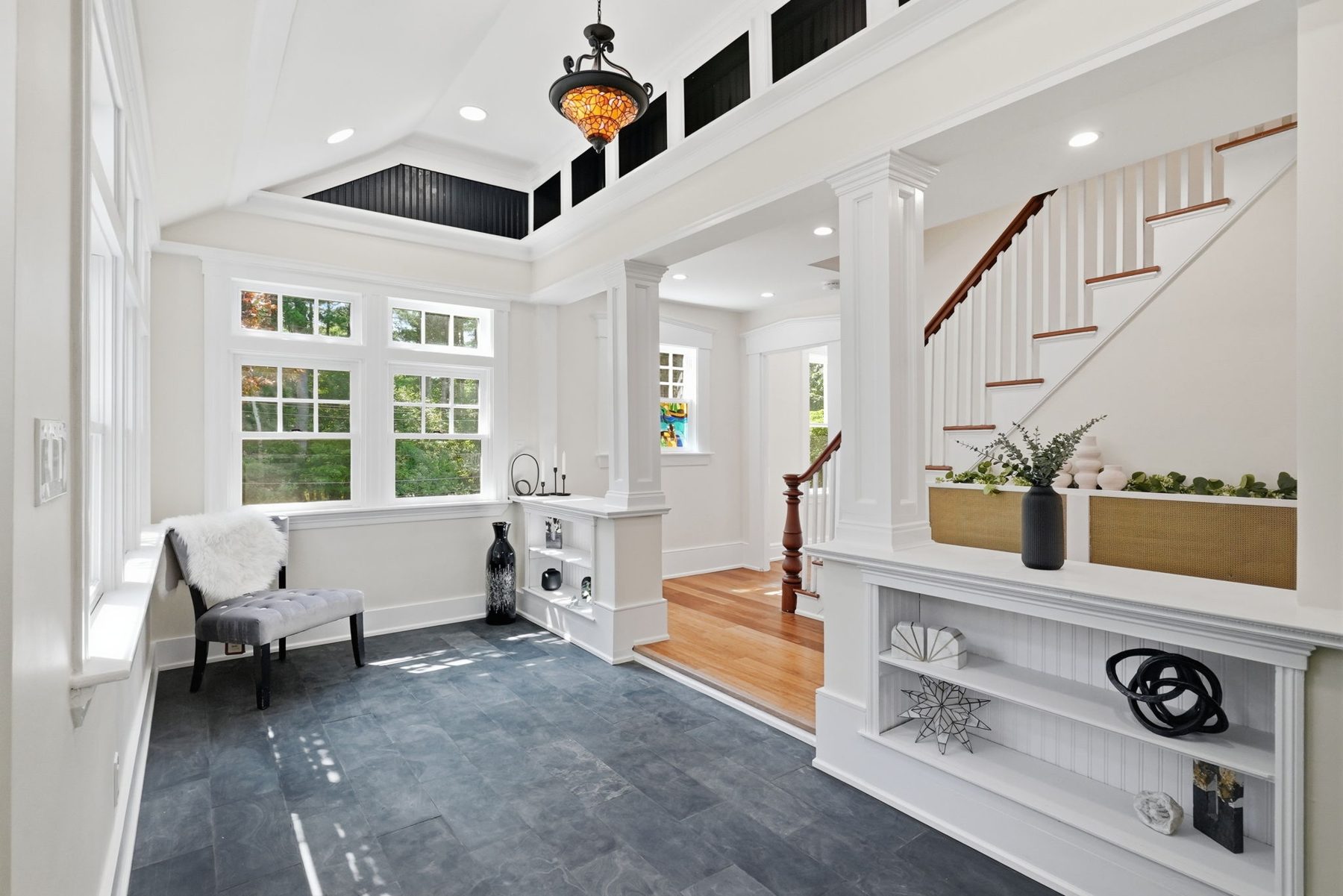 8 Pemberton Road, Wayland — Entry: slate floor, original stained-glass pendant, built-in bench