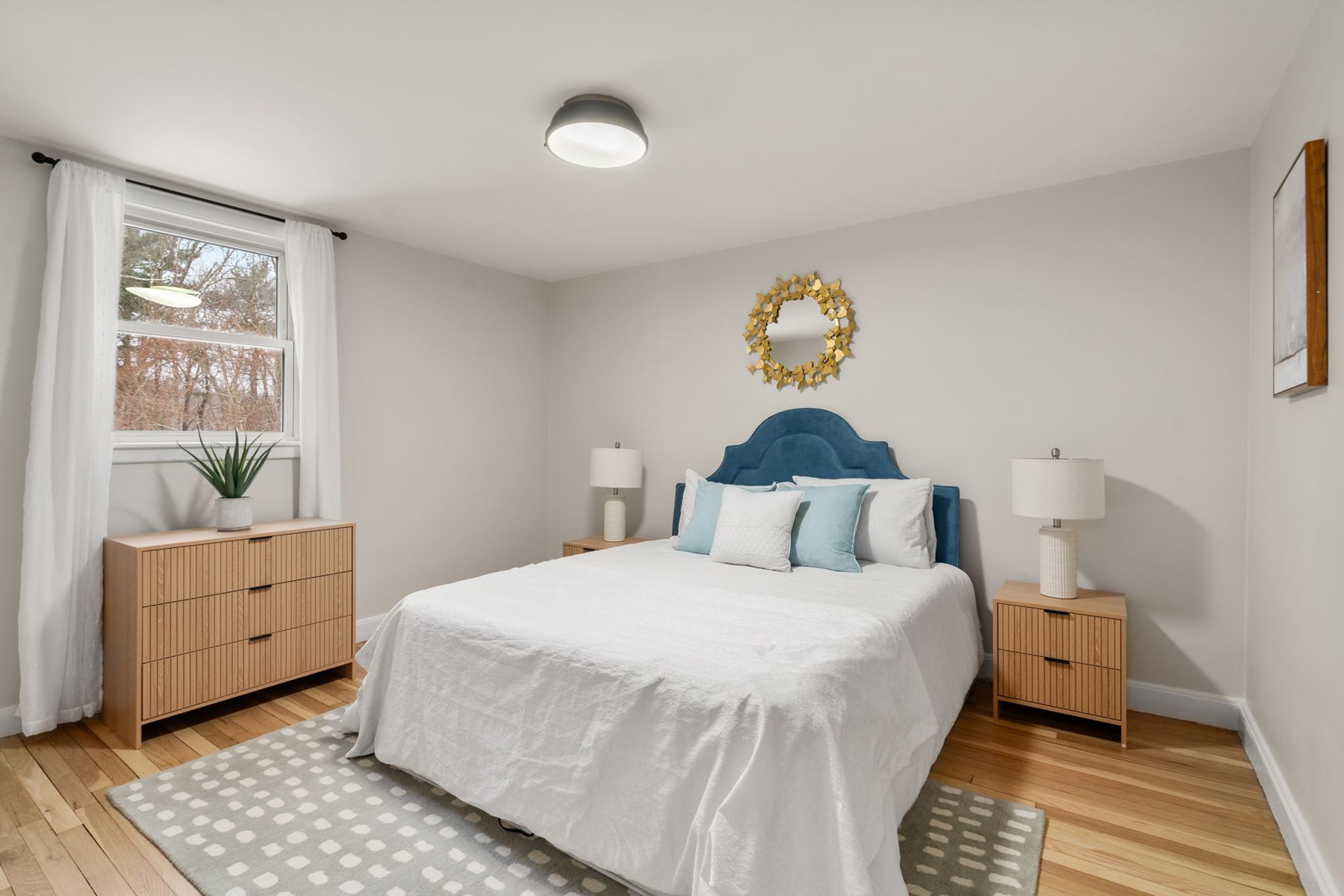 Staged bedroom at 11 Wilshire Dr, Sharon, MA